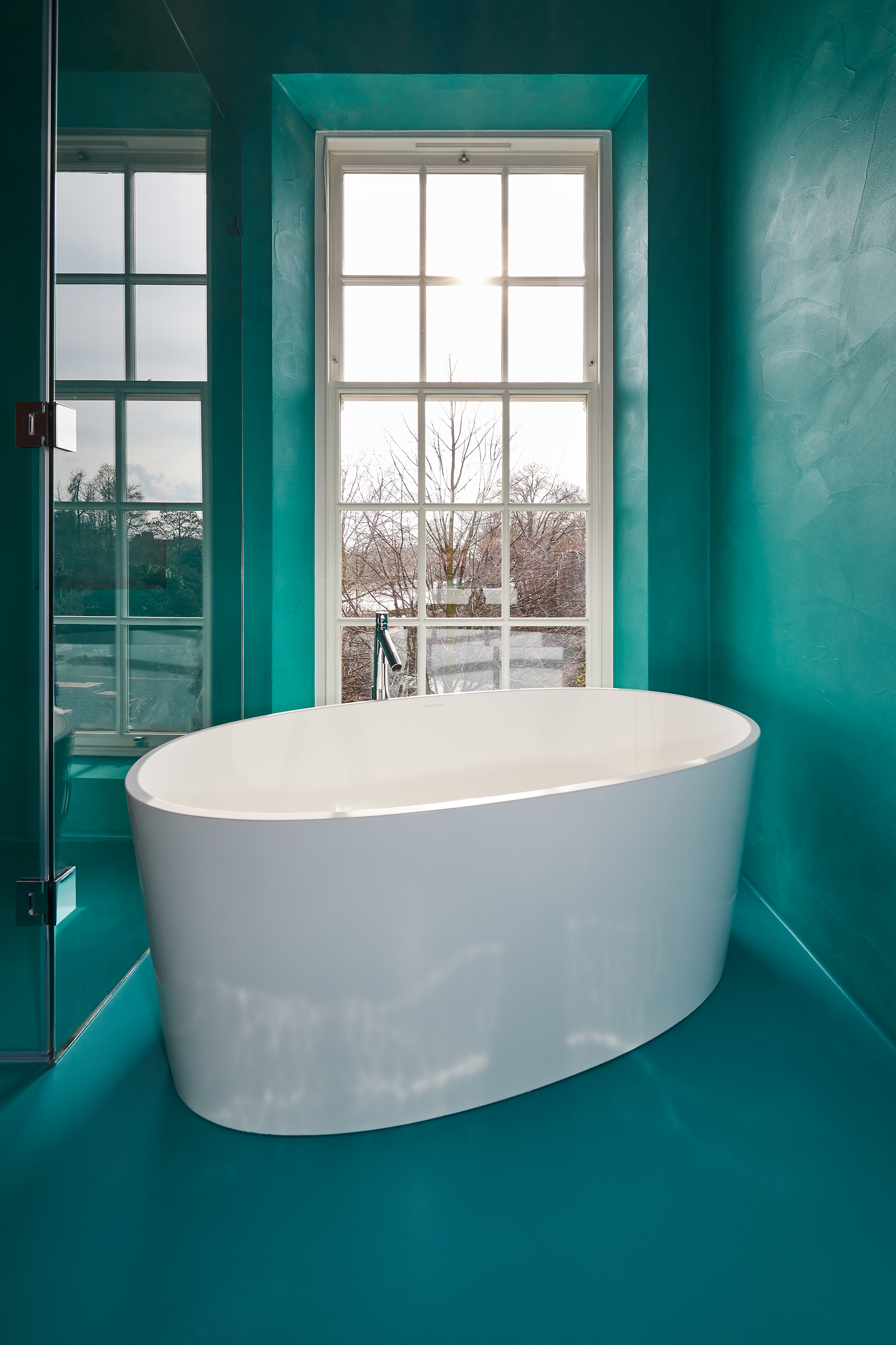 bathroom with blue resin walls 