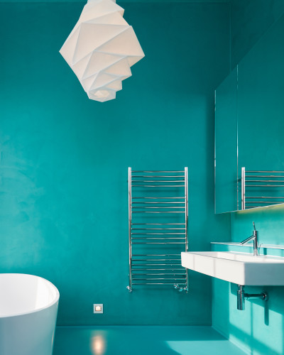 turquoise micro-cement bathroom wall 